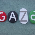 Gaza or Gaza City, Palestinian city in the Gaza Strip composed with national flag stone letters