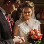 groom and bride in church during wedding ceremony,